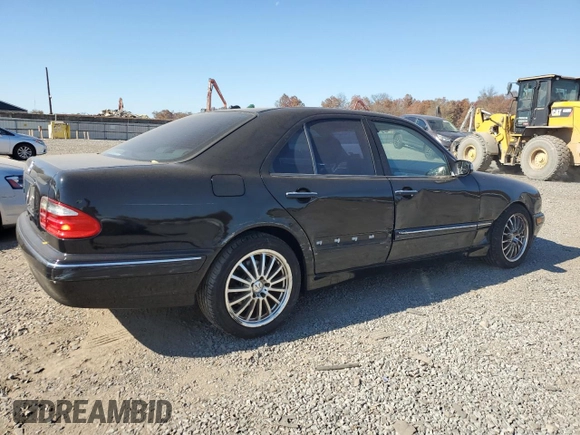 2002 Mercedes-Benz E-Class with VIN WDBJF70J82B492531, listed as a Copart auction lot 77485094 with 85,750 mi miles and Salvage Title. Bid and sale history available at carsss.com. Image 3.