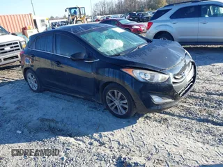 2013 Hyundai Elantra GT with VIN KMHD35LE4DU052755, listed as a IAAI auction lot 41157399 with 146,884 mi miles. Bid and sale history available at carsss.com. Image 1.