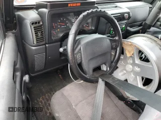 2004 Jeep Wrangler Rubicon z VIN 1J4FA69S24P713388, wystawiony jako Copart lot #61196515 z przebiegiem 155 092 mil mil oraz Czysty tytuł • Clean title. Historia ofert i sprzedaży dostępna na DreamBid. Obrazek 8.