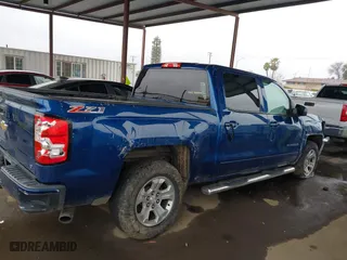 2016 Chevrolet Silverado 1500 LT with VIN 3GCUKREC6GG266485, listed as a IAAI auction lot 41720514 with 105,464 mi miles. Bid and sale history available at carsss.com. Image 13.
