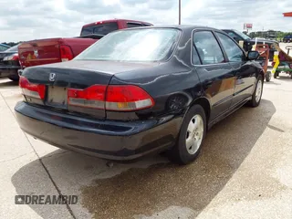2001 Honda Accord EX z VIN 1HGCG16571A046374, wystawiony jako IAAI lot #42210342 z przebiegiem 184 261 mil mil oraz . Historia ofert i sprzedaży dostępna na DreamBid. Obrazek 4.