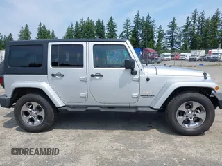 2012 Jeep Wrangler Unlimited Altitude with VIN 1C4HJWEG2CL140059, listed as a IAAI auction lot 42433563 with 189,868 mi miles and . Bid and sale history available at DreamBid. Image 13.