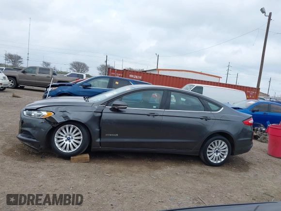 2016 Ford Fusion SE Hybrid with VIN 3FA6P0LU5GR235241, listed as a IAAI auction lot 41697504 with 165,510 mi miles. Bid and sale history available at carsss.com. Image 14.