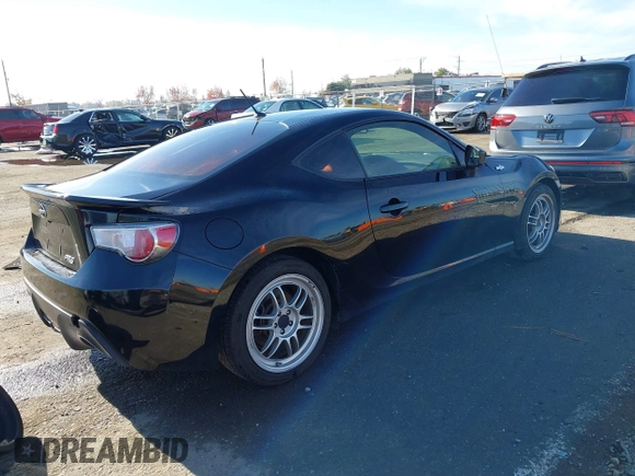 2014 Scion FR-S z VIN JF1ZNAA18E9700718, wystawiony jako IAAI lot #40958319 z przebiegiem 104 010 mil mil oraz . Historia ofert i sprzedaży dostępna na DreamBid. Obrazek 4.