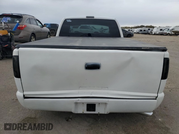 2000 GMC Sonoma SLS z VIN 1GTCS19W8Y8176036, wystawiony jako Copart lot #78777564 z przebiegiem 159 084 mil mil oraz Szkody całkowita. Historia ofert i sprzedaży dostępna na DreamBid. Obrazek 6.
