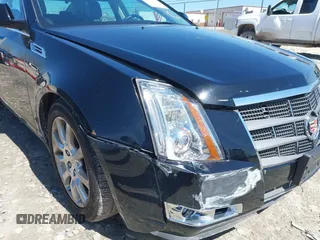 2008 Cadillac CTS AWD w/1SA with VIN 1G6DG577280147464, listed as a IAAI auction lot 42048962 with 132,683 mi miles. Bid and sale history available at carsss.com. Image 6.
