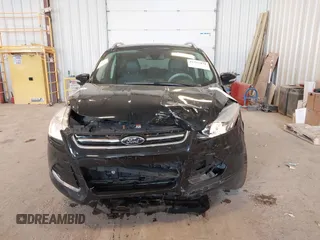 2016 Ford Escape Titanium with VIN 1FMCU0JX3GUB70607, listed as a IAAI auction lot 41727421 with 106,857 mi miles. Bid and sale history available at carsss.com. Image 13.