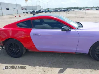 2021 Ford Mustang EcoBoost with VIN 1FA6P8TH2M5101061, listed as a IAAI auction lot 42546464 with 90,592 mi miles and . Bid and sale history available at DreamBid. Image 14.