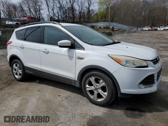 2014 Ford Escape SE with VIN 1FMCU0GX4EUB83323, listed as a Copart auction lot 51775125 with 129,437 mi miles and Salvage Title. Bid and sale history available at DreamBid. Image 4.