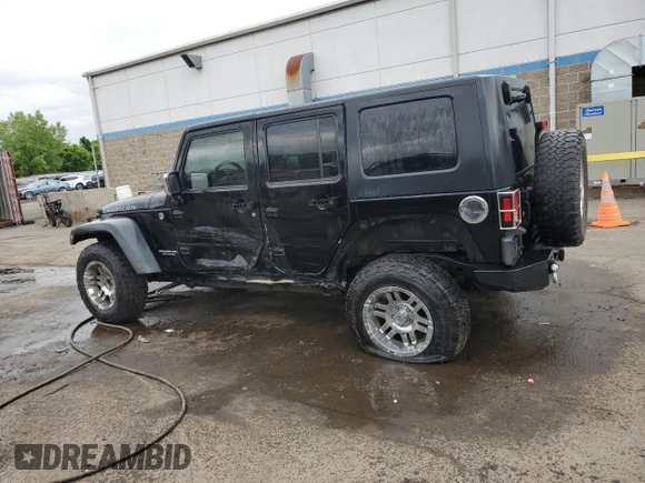 2008 Jeep Wrangler Unlimited Rubicon with VIN 1J4GA691X8L590979, listed as a Copart auction lot 57840575 with 195,458 mi miles and Salvage title. Bid and sale history available at DreamBid. Image 2.