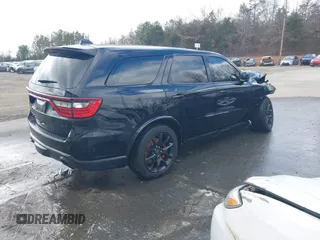 2023 Dodge Durango SRT Hellcat Premium with VIN 1C4SDJH90PC557375, listed as a IAAI auction lot 41328850 with 30,697 mi miles and . Bid and sale history available at DreamBid. Image 4.