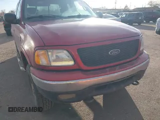2001 Ford F-150 XL with VIN 1FTRX18L21NB46718, listed as a IAAI auction lot 41477101 with 156,702 mi miles. Bid and sale history available at carsss.com. Image 6.
