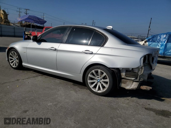2011 BMW 3 Series 328i with VIN WBAPH5C56BA442027, listed as a Copart auction lot 62583355 with 154,066 mi miles and Salvage title. Bid and sale history available at DreamBid. Image 2.