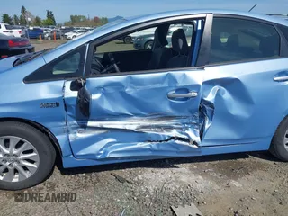 2012 Toyota Prius z VIN JTDKN3DP0C3017886, wystawiony jako IAAI lot #41966038 z przebiegiem 41 923 mil mil oraz . Historia ofert i sprzedaży dostępna na DreamBid. Obrazek 6.