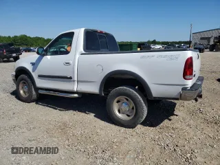 2001 Ford F-150 XL with VIN 1FTRF18L41NB60977, listed as a Copart auction lot 54933785 with 238,700 mi miles and Salvage title. Bid and sale history available at DreamBid. Image 2.