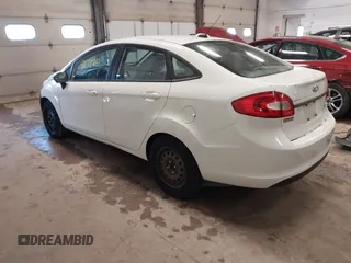 2012 Ford Fiesta S with VIN 3FADP4AJ9CM140647, listed as a IAAI auction lot 41633251 with 117,309 mi miles. Bid and sale history available at carsss.com. Image 3.