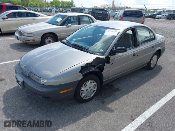 1997 Saturn SL z VIN 1G8ZH5285VZ117635, wystawiony jako IAAI lot #42153929 z przebiegiem 193 224 mil mil oraz . Historia ofert i sprzedaży dostępna na DreamBid. Obrazek 2.