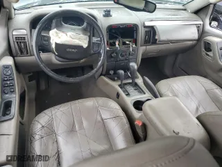 2002 Jeep Grand Cherokee Laredo with VIN 1J4GW48N02C165868, listed as a Copart auction lot 82228494 with 0 mi miles and Salvage Title. Bid and sale history available at carsss.com. Image 8.