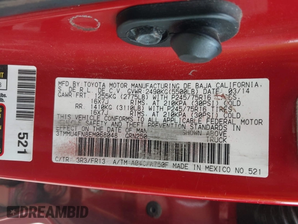 2014 Toyota Tacoma with VIN 3TMMU4FN8EM068048, listed as a IAAI auction lot 42633506 with 126,339 mi miles and . Bid and sale history available at DreamBid. Image 9.