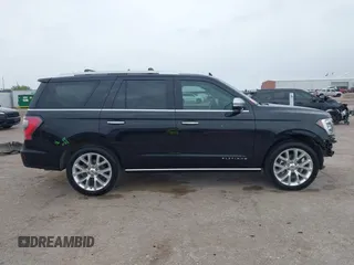 2019 Ford Expedition Platinum with VIN 1FMJU1LT1KEA23423, listed as a IAAI auction lot 42134271 with 59,180 mi miles and . Bid and sale history available at DreamBid. Image 14.
