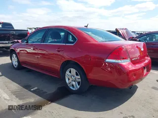 2014 Chevrolet Impala LT with VIN 2G1WB5E38E1132304, listed as a IAAI auction lot 42072869 with 128,579 mi miles and . Bid and sale history available at DreamBid. Image 3.