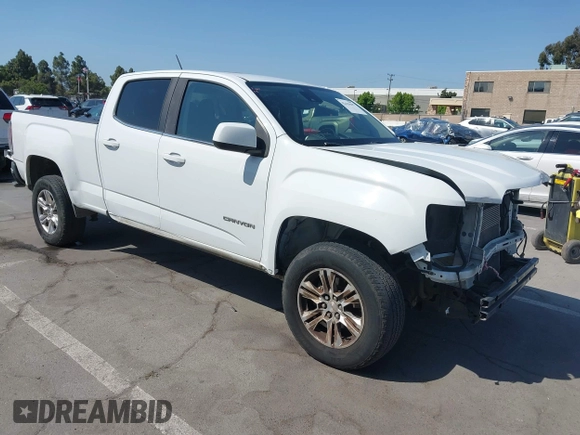 2019 GMC Canyon 2WD SLE z VIN 1GTG5CEN1K1210562, wystawiony jako IAAI lot #42419697 z przebiegiem 115 702 mil mil oraz . Historia ofert i sprzedaży dostępna na DreamBid. Obrazek 1.