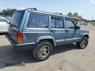 1997 Jeep Cherokee Sport with VIN 1J4FJ68S4VL607745, listed as a Copart auction lot 67521394 with 143,814 mi miles and Clean Title. Bid and sale history available at carsss.com. Image 3.