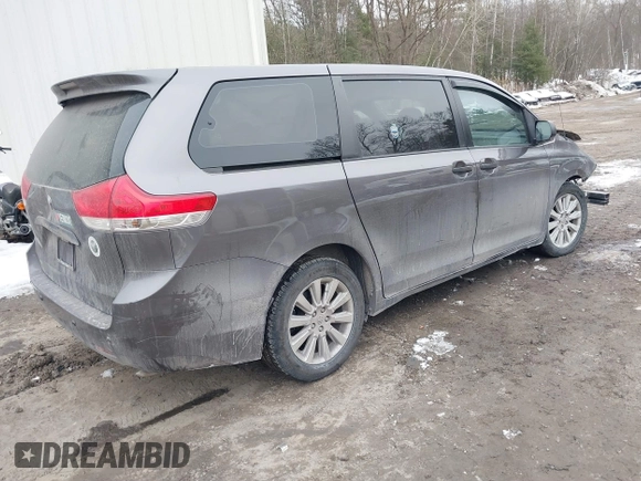 2014 Toyota Sienna L with VIN 5TDZK3DC9ES510214, listed as a IAAI auction lot 41721667 with 1 mi miles. Bid and sale history available at carsss.com. Image 4.