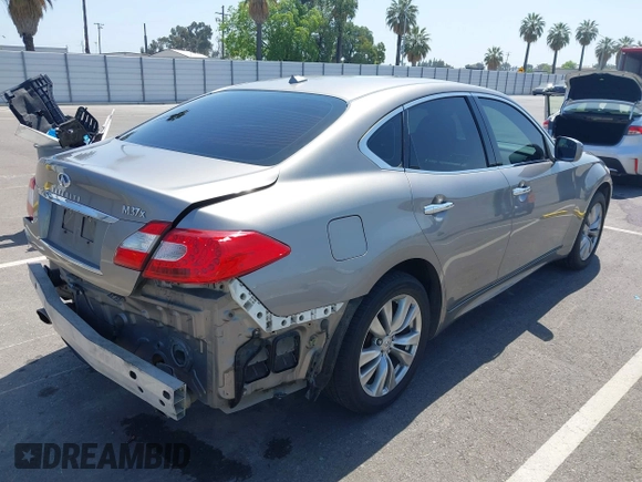2012 Infiniti M with VIN JN1BY1AR3CM391052, listed as a IAAI auction lot 42178760 with 198,116 mi miles and . Bid and sale history available at DreamBid. Image 4.