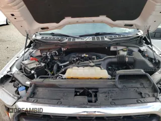 2023 Ford F-150 XL z VIN 1FTEW1EP1PKE10563, wystawiony jako Copart lot #50808675 z przebiegiem 30 670 mil mil oraz Szkoda całkowita • Salvage title. Historia ofert i sprzedaży dostępna na DreamBid. Obrazek 11.