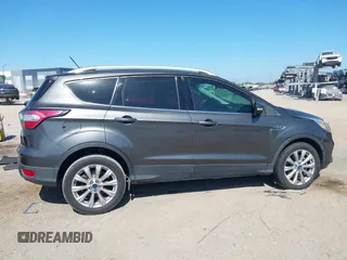 2018 Ford Escape Titanium with VIN 1FMCU0J99JUB09562, listed as a IAAI auction lot 41547659 with 63,700 mi miles and . Bid and sale history available at DreamBid. Image 13.