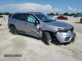 2019 Jeep Cherokee Latitude Plus with VIN 1C4PJLLB6KD338752, listed as a Copart auction lot 56044725 with 70,448 mi miles and Salvage title. Bid and sale history available at DreamBid. Image 4.