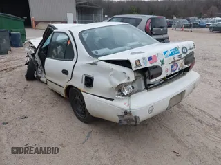 1997 Geo Prizm LSi with VIN 1Y1SK5266VZ417087, listed as a IAAI auction lot 42009913 with 198,041 mi miles. Bid and sale history available at carsss.com. Image 3.