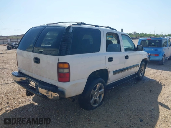 2001 Chevrolet Tahoe LS with VIN 1GNEC13V81J292896, listed as a IAAI auction lot 42061466 with 207,762 mi miles and . Bid and sale history available at DreamBid. Image 4.