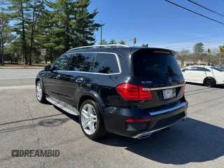 2014 Mercedes-Benz GL-Class GL 550 with VIN 4JGDF7DE1EA318611, listed as a Copart auction lot 54084385 with 184,784 mi miles and Clean Title. Bid and sale history available at carsss.com. Image 4.