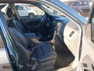 2007 Honda Pilot EX-L with VIN 5FNYF285X7B045780, listed as a IAAI auction lot 41324224 with 168,911 mi miles. Bid and sale history available at carsss.com. Image 5.