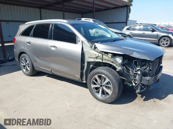 2019 Kia Sorento EX with VIN 5XYPHDA50KG514825, listed as a IAAI auction lot 41612310 with 100,855 mi miles and . Bid and sale history available at DreamBid. Image 1.