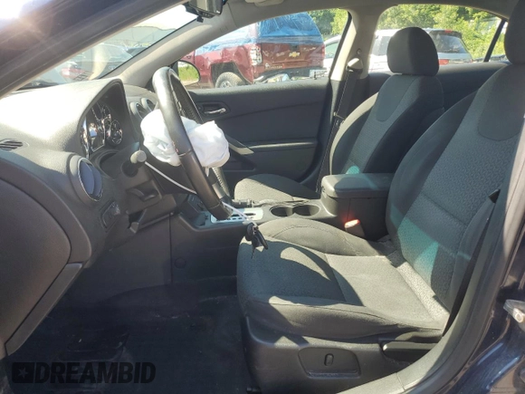 2009 Pontiac G6 1SB with VIN 1G2ZJ57K694272894, listed as a Copart auction lot 63006935 with 125,640 mi miles and Clean title. Bid and sale history available at DreamBid. Image 7.