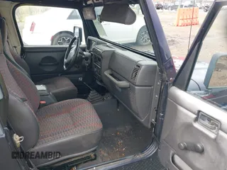 1999 Jeep Wrangler Sport with VIN 1J4FY19S9XP419330, listed as a IAAI auction lot 41913314 with 167,176 mi miles. Bid and sale history available at carsss.com. Image 5.