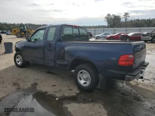 2003 Ford F-150 XL with VIN 1FTRX07273KB66549, listed as a Copart auction lot 83552004 with 205,026 mi miles and Salvage Title. Bid and sale history available at carsss.com. Image 2.