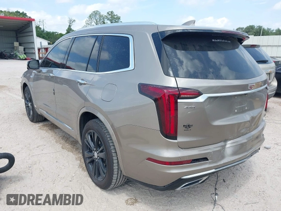 2022 Cadillac XT6 Premium Luxury z VIN 1GYKPCRS4NZ107852, wystawiony jako IAAI lot #42075012 z przebiegiem 66 046 mil mil oraz . Historia ofert i sprzedaży dostępna na DreamBid. Obrazek 3.