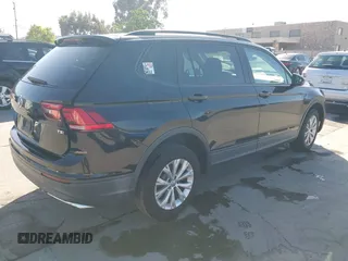 2018 Volkswagen Tiguan S with VIN 3VV1B7AX1JM091928, listed as a IAAI auction lot 42283454 with 53,650 mi miles and . Bid and sale history available at DreamBid. Image 4.
