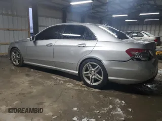 2011 Mercedes-Benz E 550 Luxury with VIN WDDHF9AB7BA329836, listed as a Copart auction lot 56371885 with 245,527 mi miles and Salvage title. Bid and sale history available at DreamBid. Image 2.