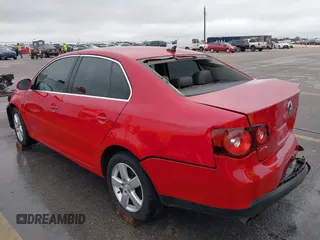 2009 Volkswagen Jetta Sedan SE with VIN 3VWRM71K99M123288, listed as a IAAI auction lot 41892948 with 345,159 mi miles. Bid and sale history available at carsss.com. Image 3.