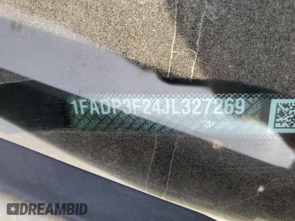 2018 Ford Focus SE with VIN 1FADP3F24JL327269, listed as a Copart auction lot 81620043 with 82,844 mi miles and Salvage Title. Bid and sale history available at carsss.com. Image 12.