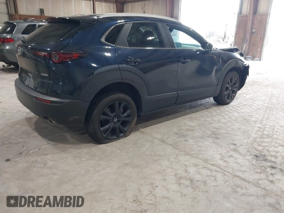 2024 Mazda CX-30 S Select Sport z VIN 3MVDMBBM2RM707143, wystawiony jako IAAI lot #42267284 z przebiegiem 6 133 mil mil oraz . Historia ofert i sprzedaży dostępna na DreamBid. Obrazek 4.