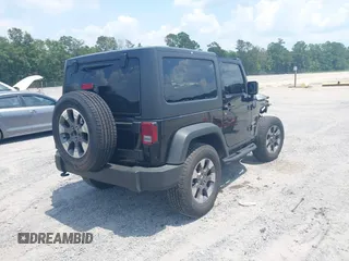 2017 Jeep Wrangler Sport z VIN 1C4AJWAG0HL618140, wystawiony jako IAAI lot #42582104 z przebiegiem 77 883 mil mil oraz . Historia ofert i sprzedaży dostępna na DreamBid. Obrazek 4.