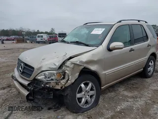 2003 Mercedes-Benz M-Class 3.2L with VIN 4JGAB54E43A383811, listed as a IAAI auction lot 41204136 with 209,327 mi miles. Bid and sale history available at carsss.com. Image 6.