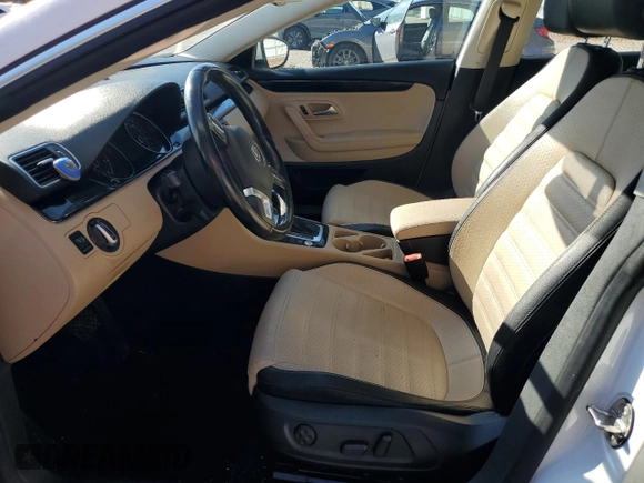 2016 Volkswagen CC Sport with VIN WVWBP7AN0GE512975, listed as a Copart auction lot 45030345 with 106,005 mi miles and Salvage Title. Bid and sale history available at carsss.com. Image 7.