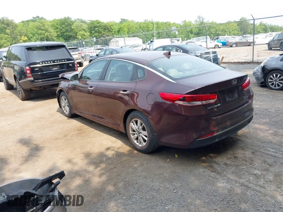 2018 Kia Optima LX with VIN 5XXGT4L36JG185545, listed as a IAAI auction lot 42434301 with 118,303 mi miles and . Bid and sale history available at DreamBid. Image 3.